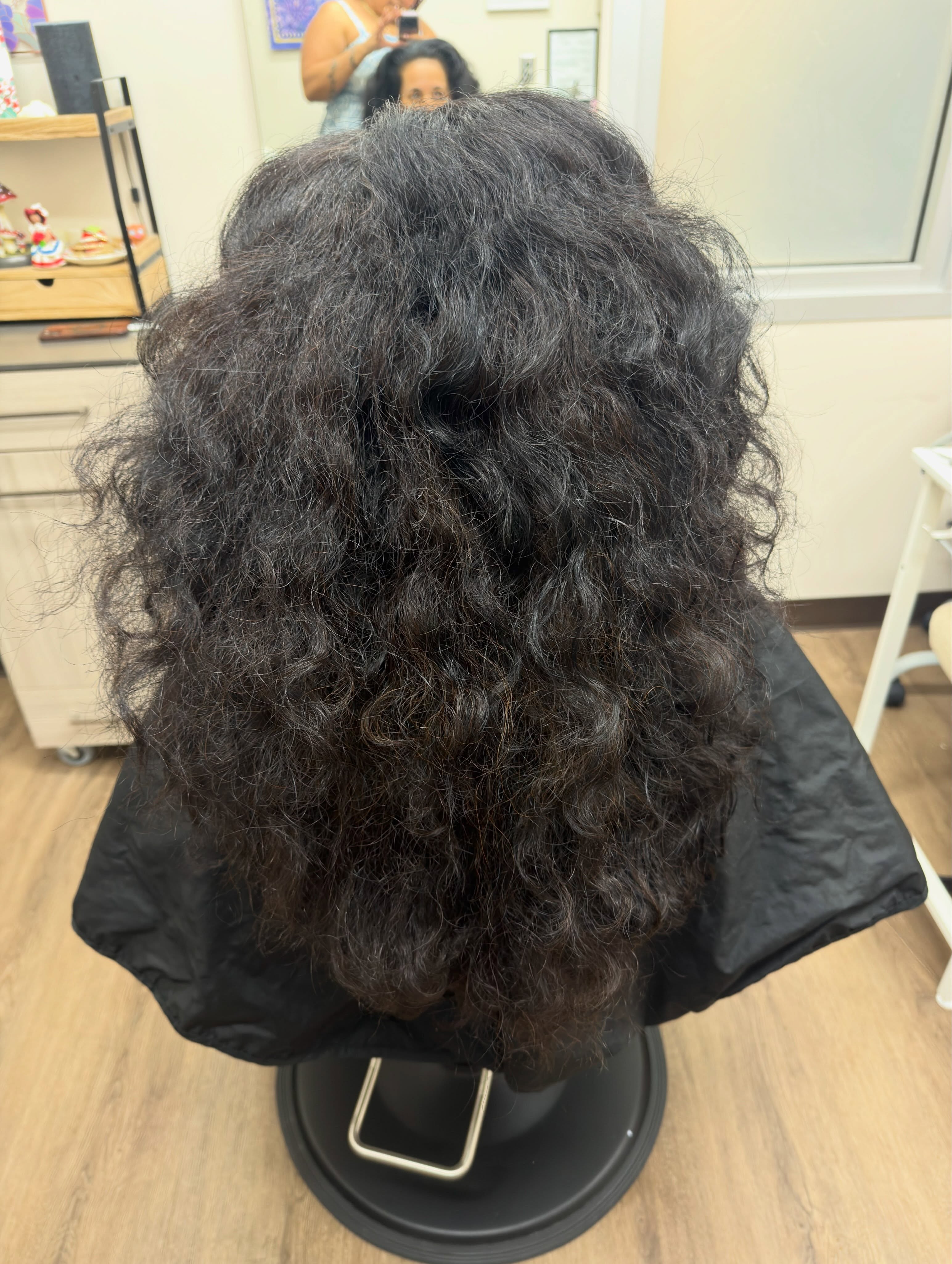 Before: dry, frizzy curls ahead of a Hair Botox series
